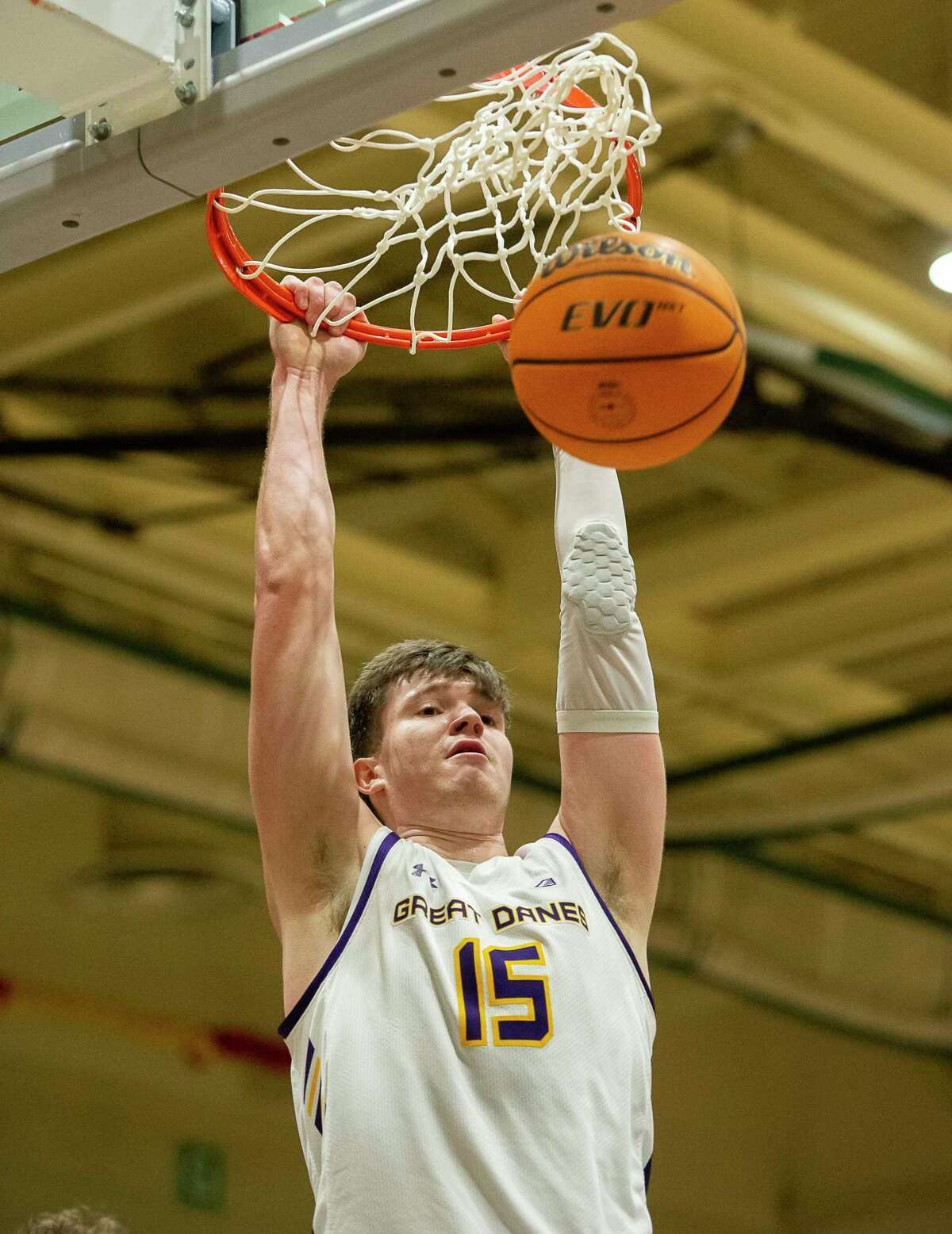 Albany’s Jonathan Beagle dunks the ball during a game against Maine at McDonough Sports Complex in Troy, N.Y. on Saturday, Jan. 28, 2023. (Jenn March, Special to the Times Union)