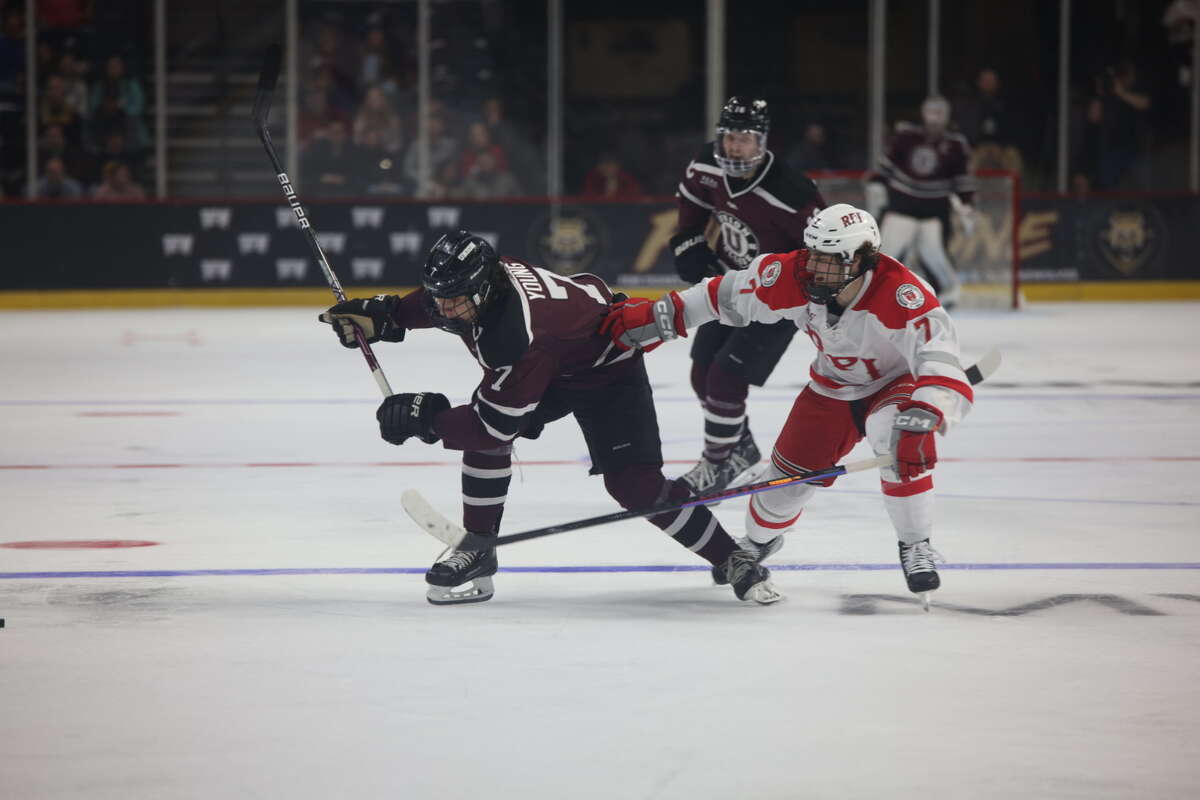 RPI's Max Smolinski, right, battles with Union's Nick Young earlier this season. Smolinski has played in every game for the Engineers this season.