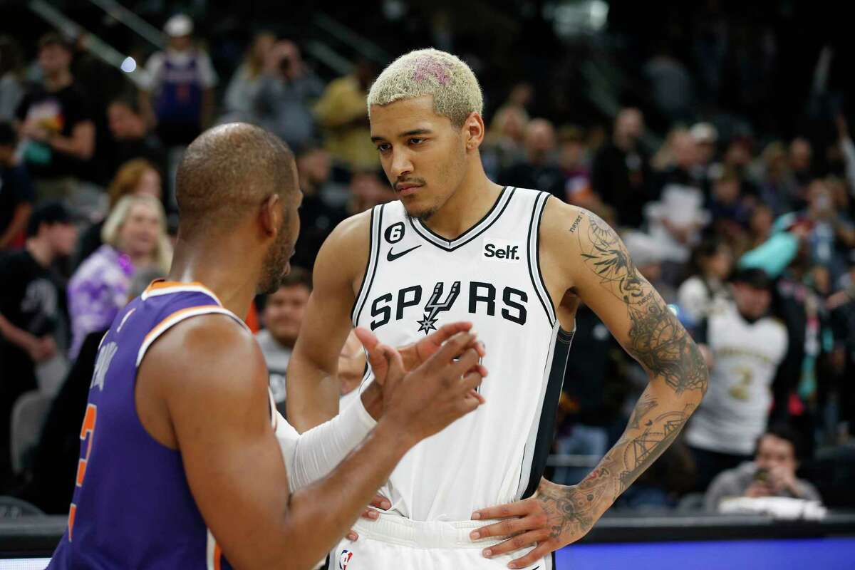 San Antonio Spurs Jeremy Sochan (10) listens to advice given to him by Phoenix Suns Chris Paul (3) at the end of the game on Saturday, Jan. 28, 2023 at the AT&T Center. Phoenix Suns defeated the San Antonio Spurs 128-118 in OT.
