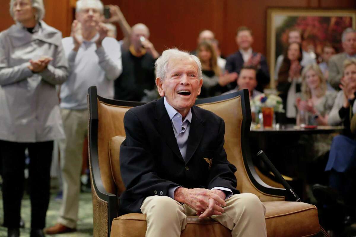 Jackie Burke listens to stories about him told by golf dignataries during his100th birthday party at his Champions Golf Club Sunday, Jan. 29, 2023 in Houston, TX.