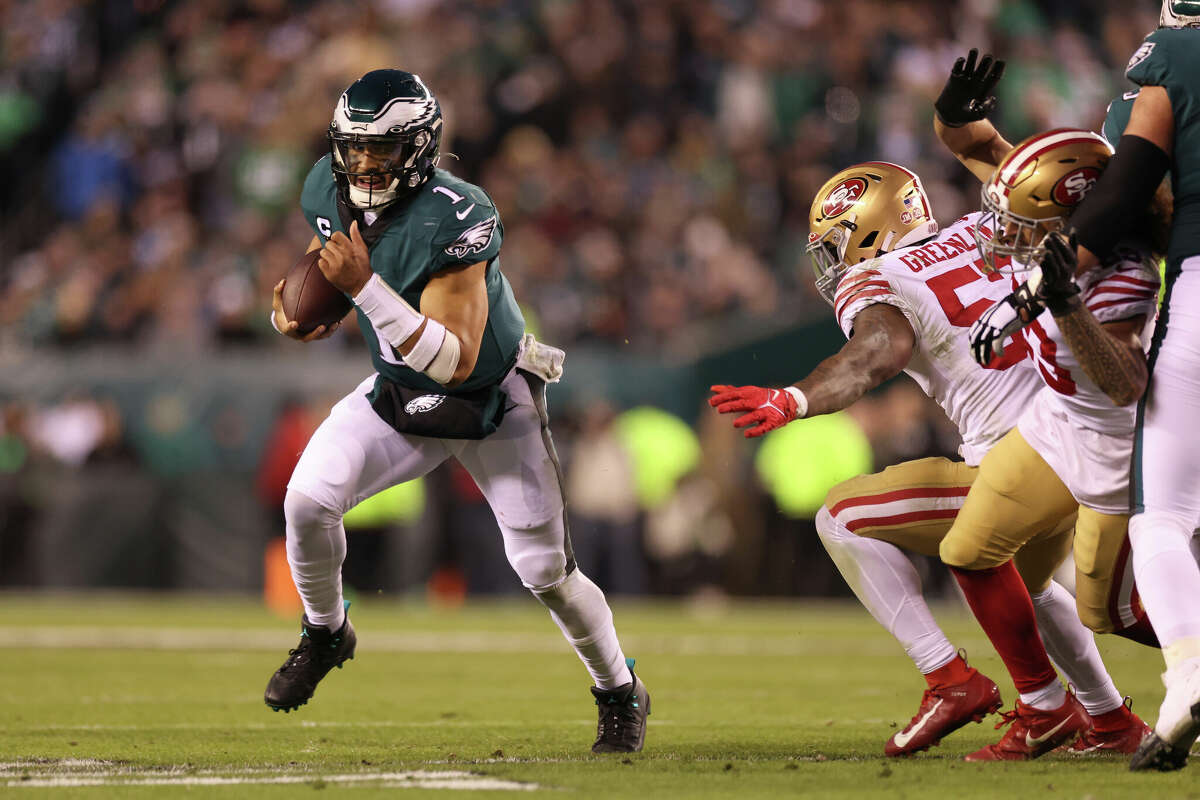 Quarterback Jalen Hurts of the Philadelphia Eagles runs the ball