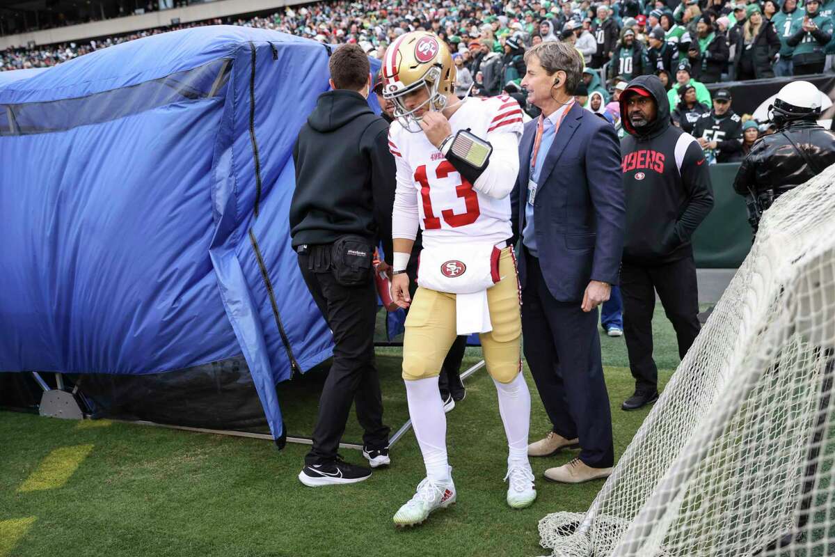 San Francisco 49ers' quarterback Brock Purdy, 13, exits the medical tent in the first quarter during the NFC Championship Game against the Philadelphia Eagles at Lincoln Financial Field in Philadelphia, Pa., on Sunday, Jan. 29, 2023.