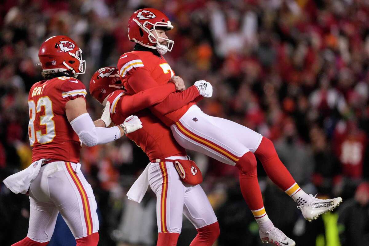 Chiefs kicker Harrison Butker gets lifted in the air after his game-winning field goal against the Cincinnati Bengals with 3 seconds remaining in the AFC Championship.