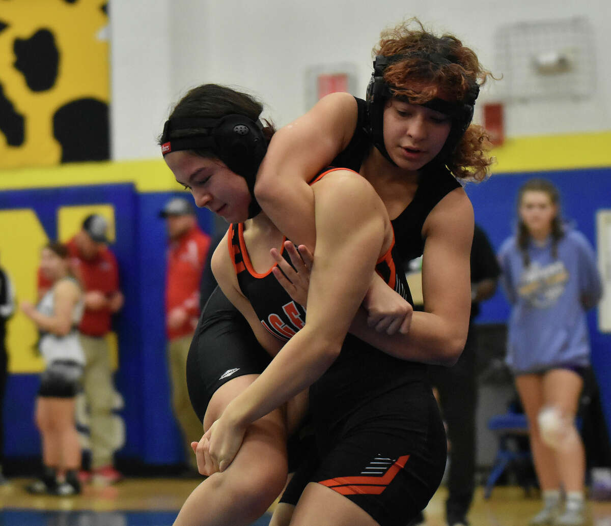Edwardsville's Ali Chong, left, on Saturday in the Seckman Women's Tournament in Imperial, Missouri.