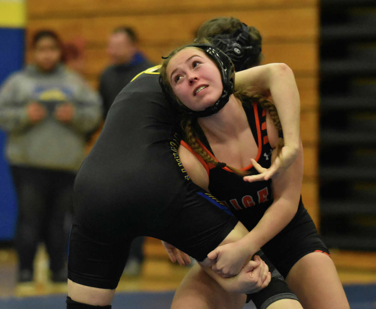 Edwardsville's Olivia Coll, right, on Saturday in the Seckman Women's Tournament in Imperial, Missouri.