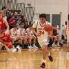 Xavier Allen (24) dribbles down the court in a game earlier this season against Holton.