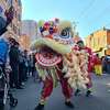 Performers put on a lion dance during a parade at Lunarfest in New Haven Jan. 28, 2023.