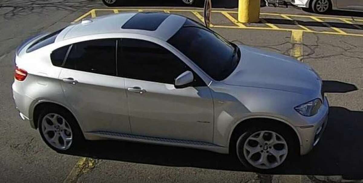 Wallingford police say they are looking for this car, a silver, four-door 2014 BMW with license plate AH3 8573, after an attempted purse-snatching at a local Stop & Shop during which a woman was dragged. 