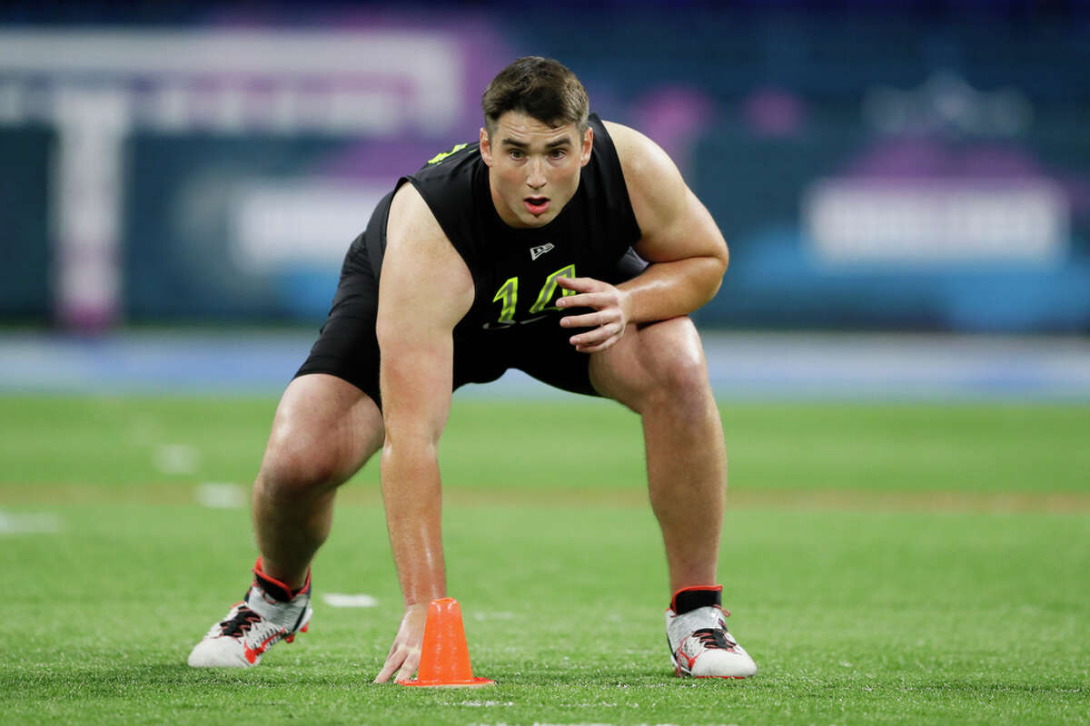 Auburn offensive lineman Jack Driscoll runs a drill at the NFL football scouting combine in Indianapolis, Friday, Feb. 28, 2020. (AP Photo/Charlie Neibergall)