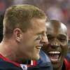 Houston Texans defensive end J.J. Watt (99) celebrates with inside linebacker DeMeco Ryans (59) during the fourth quarter of an AFC wildcard playoff football game against the Cincinnati Bengals at Reliant Stadium on Saturday, Jan. 7, 2012, in Houston. The Texans won 31-10. ( Smiley N. Pool / Houston Chronicle )