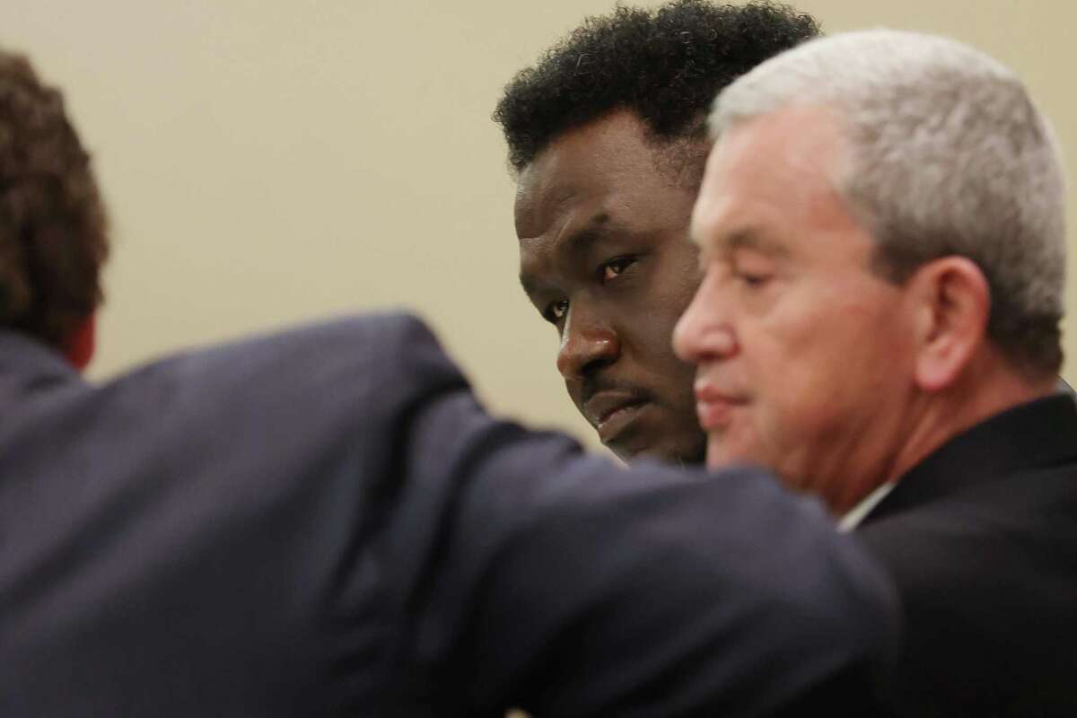 Andre McDonald with his attorneys, John T. Hunter, left, and John A. Convery, during his murder trial Monday. He is accused of killing his wife, Andreen McDonald, who went missing on March 1, 2019. Her remains were found in a field off Specht Road four months later.