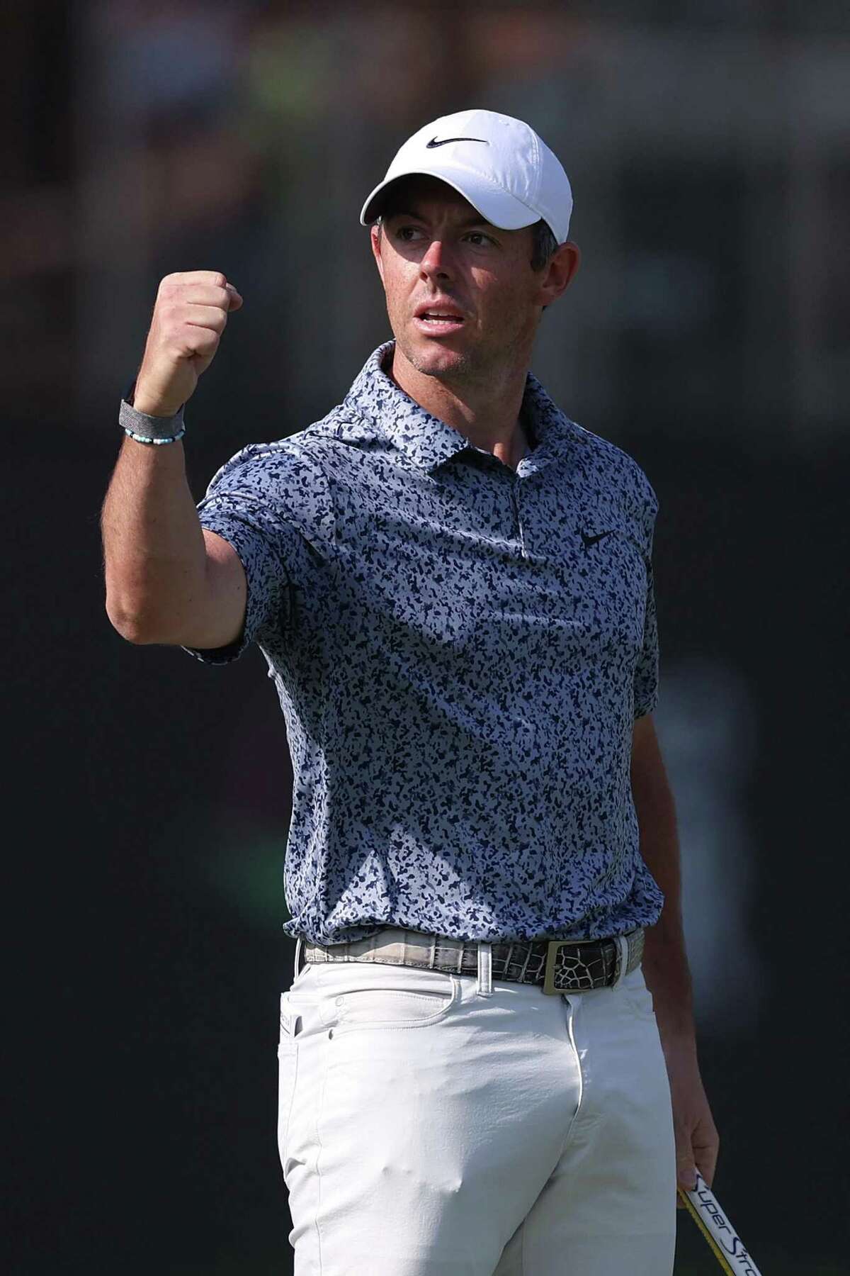 Rory McIlroy lets out some emotion after winning the Dubai Desert Classic on Monday.