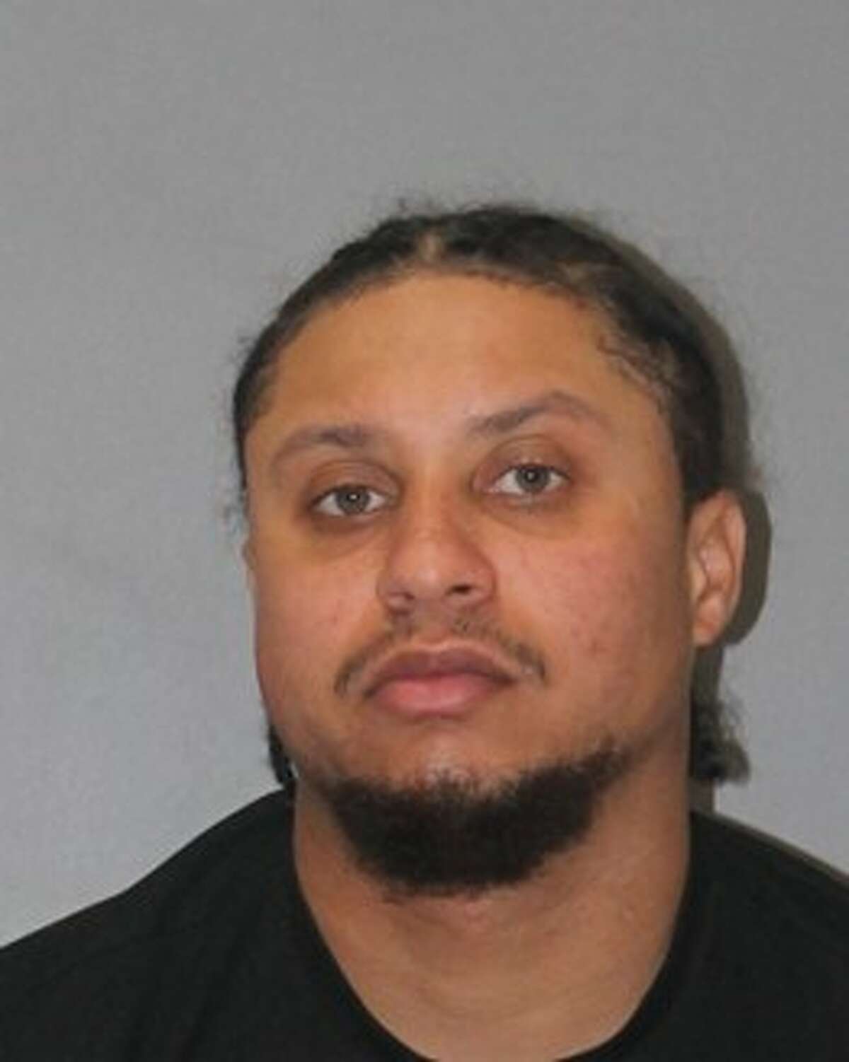 Sergio Cruz, 31, of Bridgeport, was arrested Friday after patrol officers discovered a loaded handgun stored under the driver's seat of his car during a traffic stop, according to West Hartford police. Investigators also recovered marijuana and materials used to package and sell drugs from the car, police said.