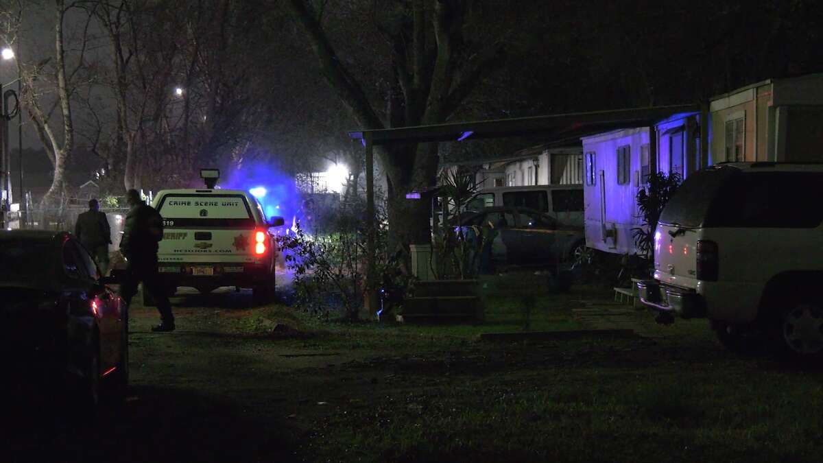 Sheriff's office investigators respond to the scene of a shooting, stabbing at a trailer in north Harris County.
