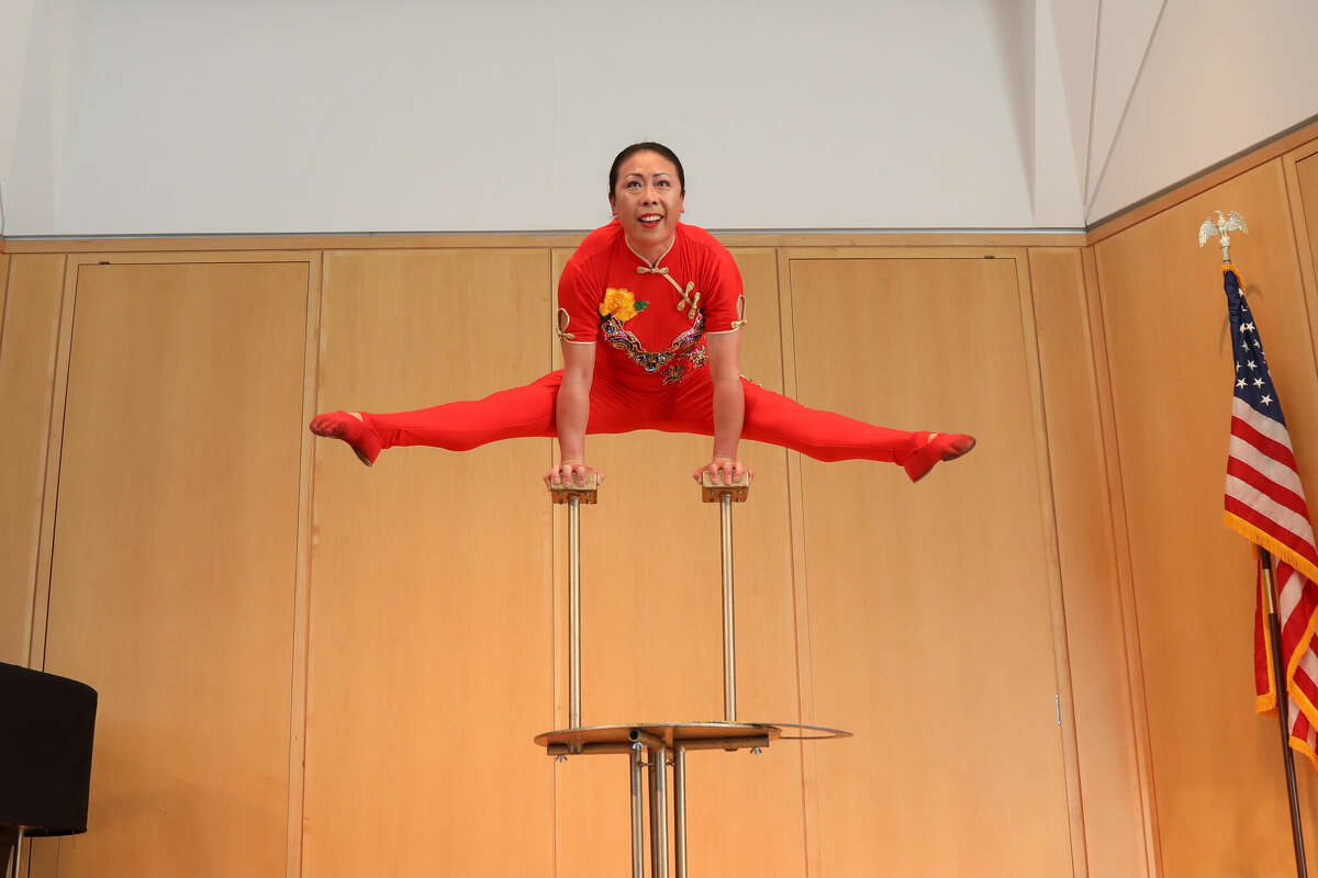 Acrobat Li Liu, a native of China and longtime Connecticut resident, performed Saturday at the Wilton Library to celebrate the Chinese New Year.