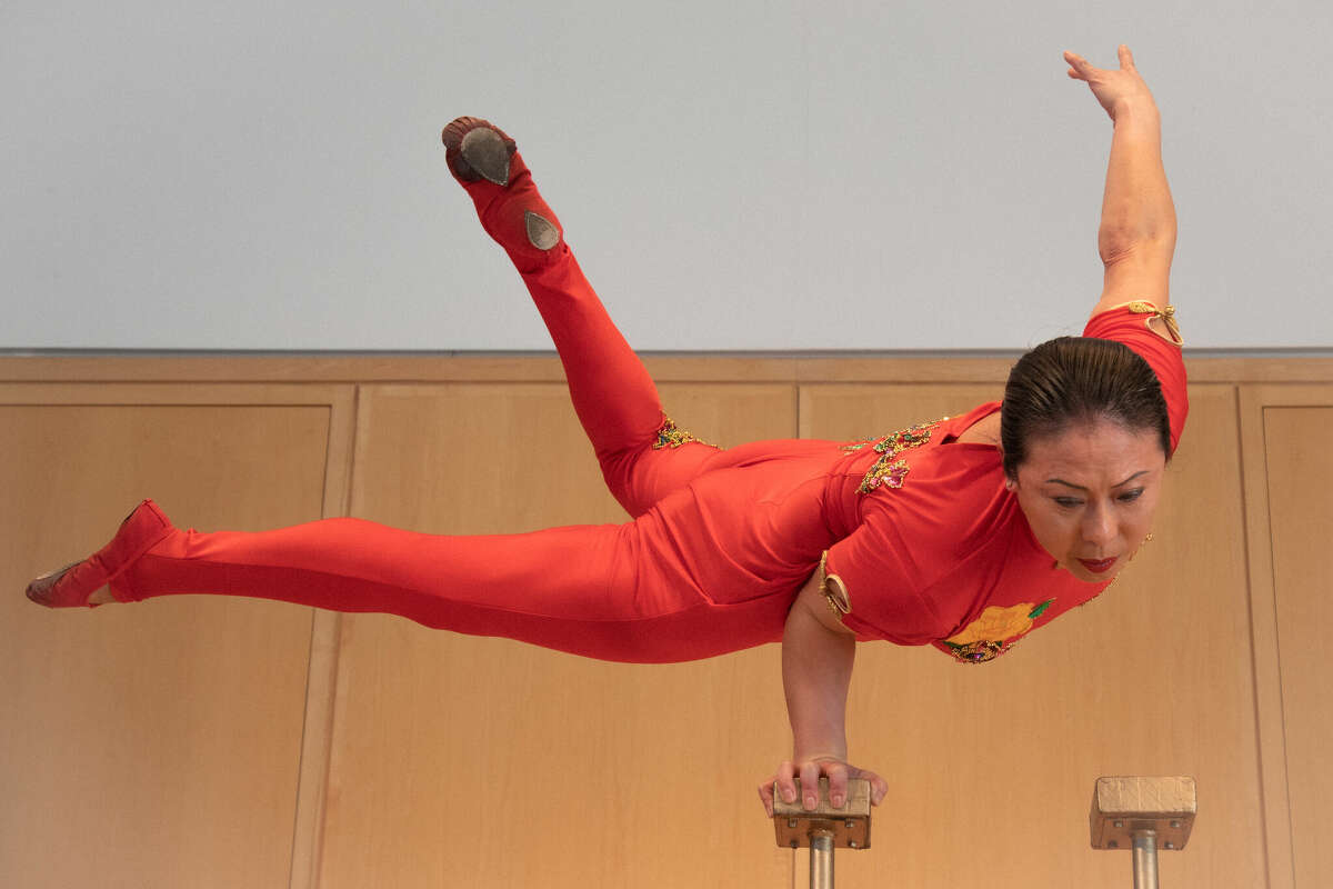 Acrobat Li Liu, a native of China and longtime Connecticut resident, performed Saturday at the Wilton Library to celebrate the Chinese New Year.