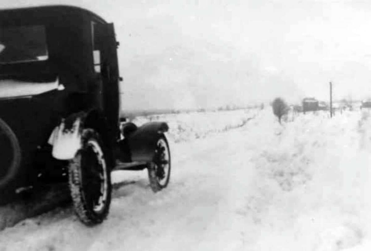February 1936 brought very harsh winter conditions to the Lake County area. Pictured is a Model T driving down a snowy road on Old U.S. 10 in Chase Township in the 1930s.