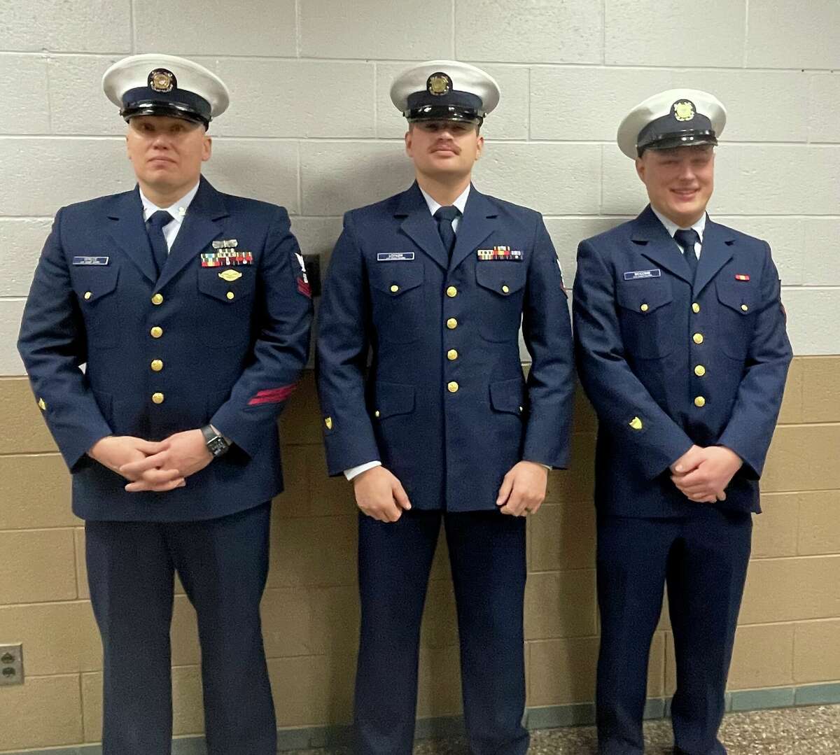 From left, U.S. Coast Guard Officers Spruce, Lotker and McComb were welcomed guests at Manistee Catholic Central in January.