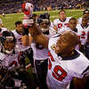 Houston Texans inside linebacker DeMeco Ryans (59) gathers his teammates together before an NFL football game against the Indianapolis Colts at Lucas Oil Stadium Thursday, Dec. 22, 2011, in Indianapolis