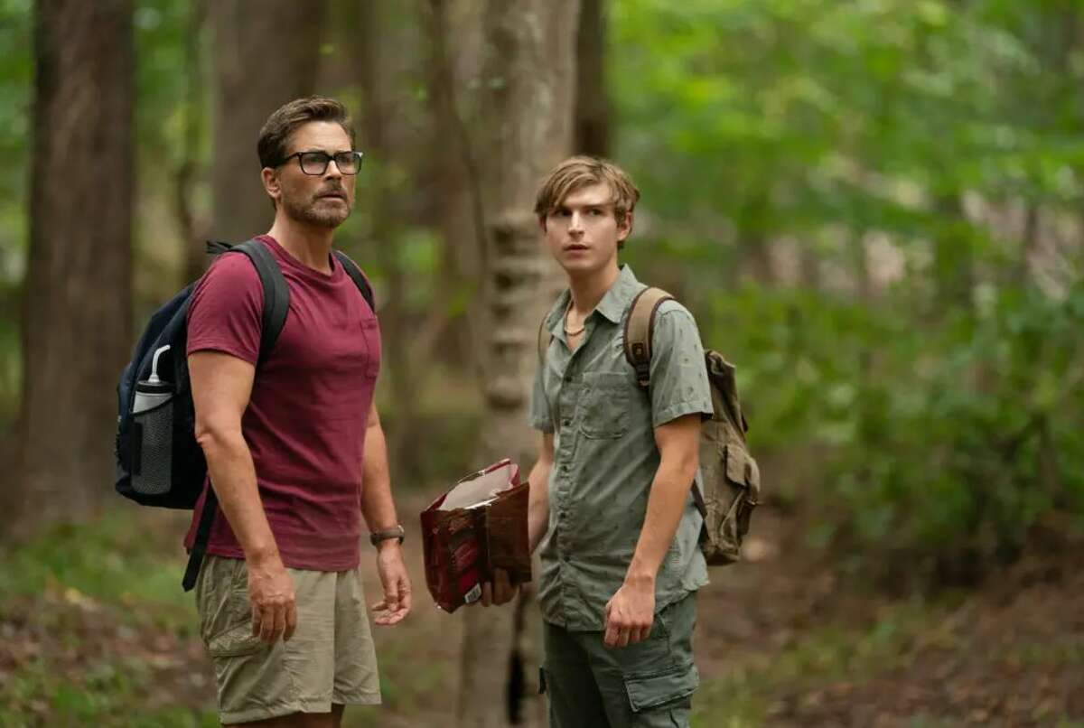 Rob Lowe, left, and Johnny Berchtold star in the Netflix film "Dog Gone based on a true story of a father and his son hiking the Appalachian Trail to find a dog named Gonker.
