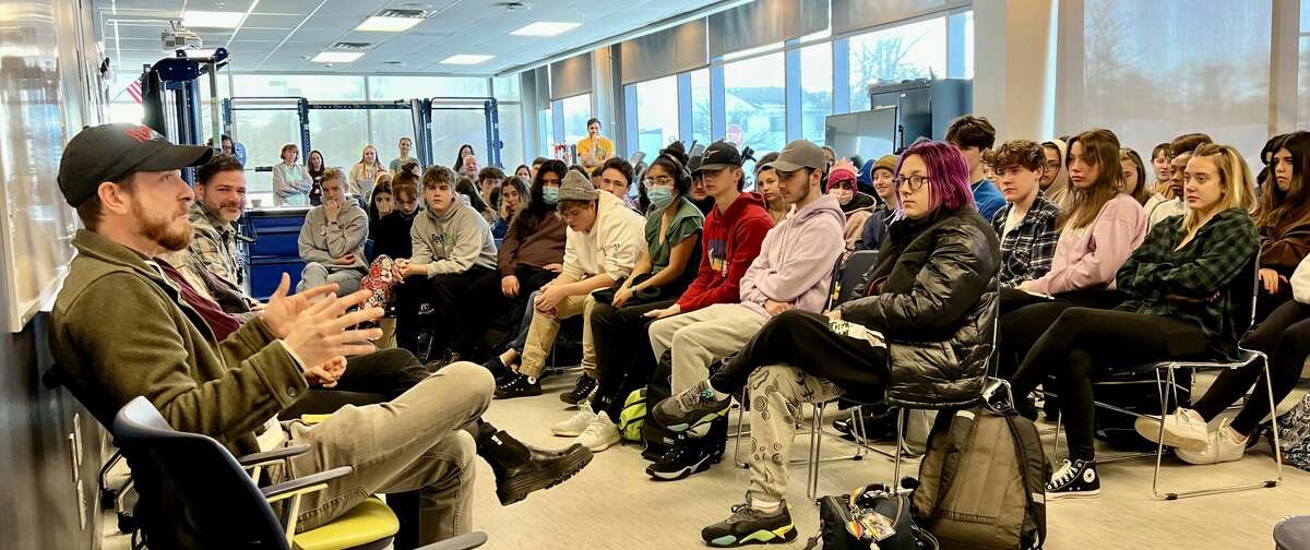 Joe Gietl, left, speaks with students at Tech Valley High School on Friday morning with a panel of filmmakers who advised students to find their passion and pursue it.