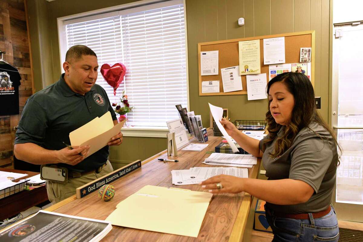 Le Roy Torres, an Iraq war veteran, and his wife, Rosie, are the founders of an organization called Burn Pit 360. Here, they prepare mailings for lawmakers. Burn pits were used in Iraq and Afghanistan to burn trash, including batteries, tires, human and medical waste. Torres has trouble with his memory, perception and emotions.