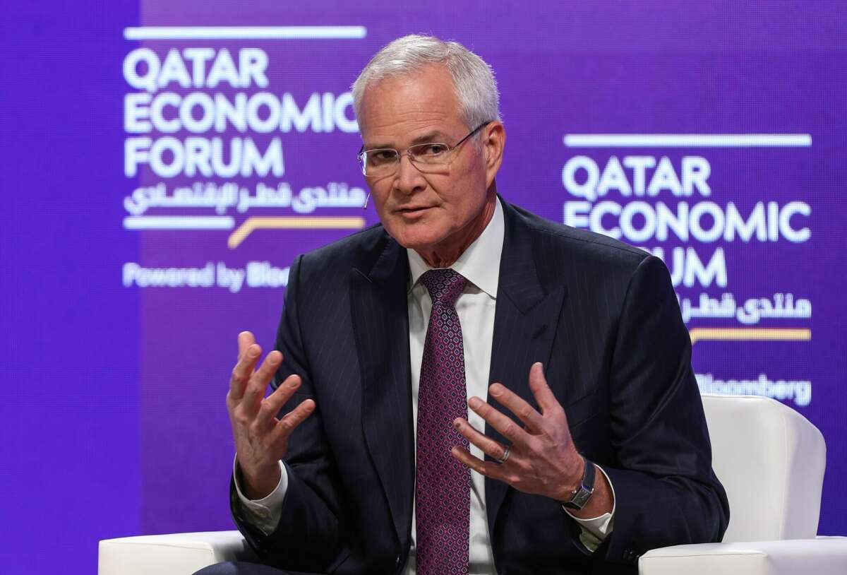 Exxon CEO Darren Woods speaks during a panel session at the Qatar Economic Forum in Doha, Qatar, in June.