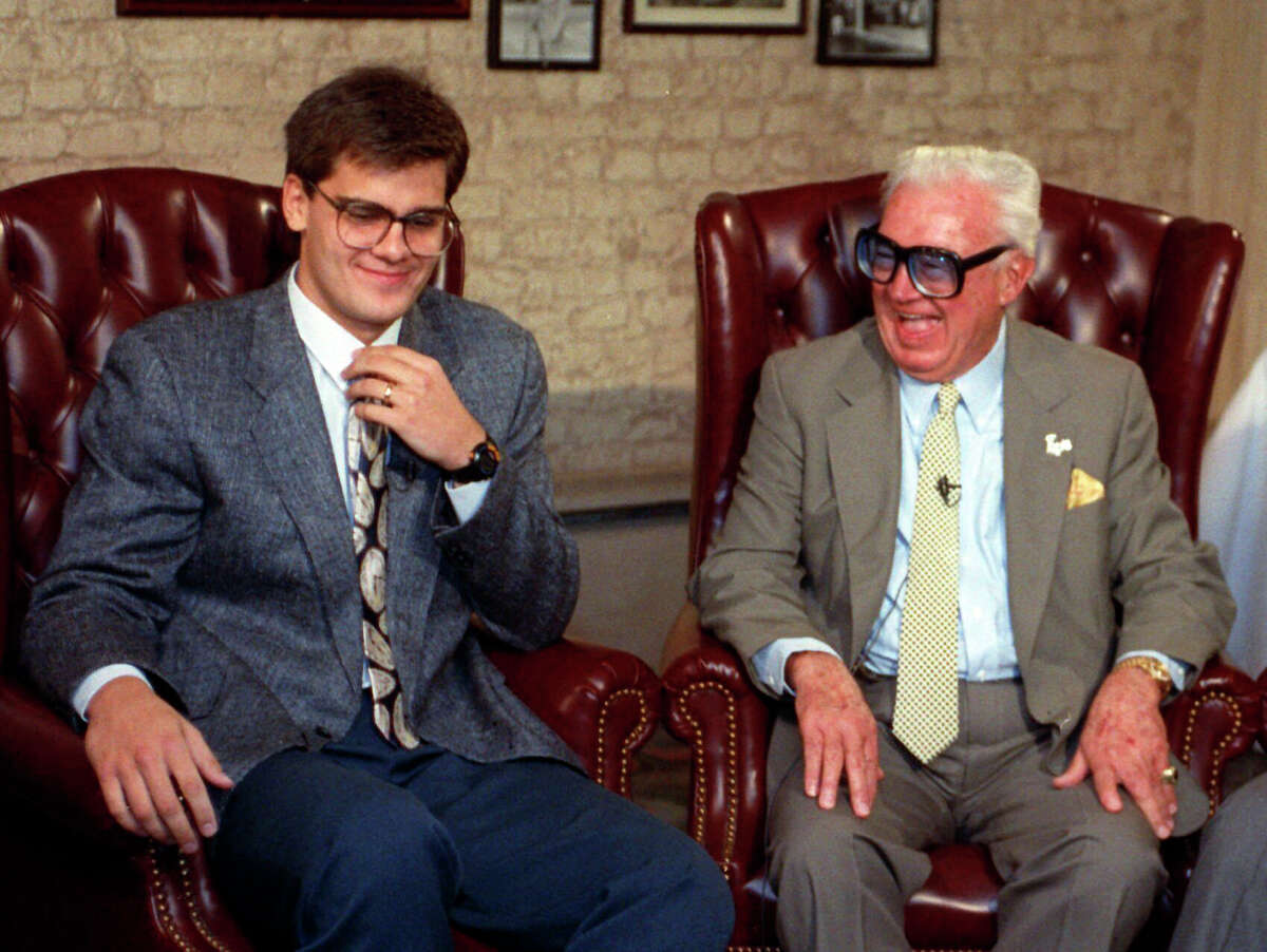 Hall of Fame baseball announcer Harry Caray, right, laughs with his grandson Chip in Chicago in this May 13, 1991 photo. Chip Caray is taking over as the TV play-by-play voice of the Cardinals, more than five decades after his grandfather and Hall of Fame broadcaster Harry Caray became a baseball staple with the same club. Bally Sports Midwest announced Caray Monday,