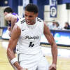 Jaquan Adams of Principia College reacts after a basket this season in Elsah. Adams is a graduate of Civic Memorial High and Lewis and Clark Community College.