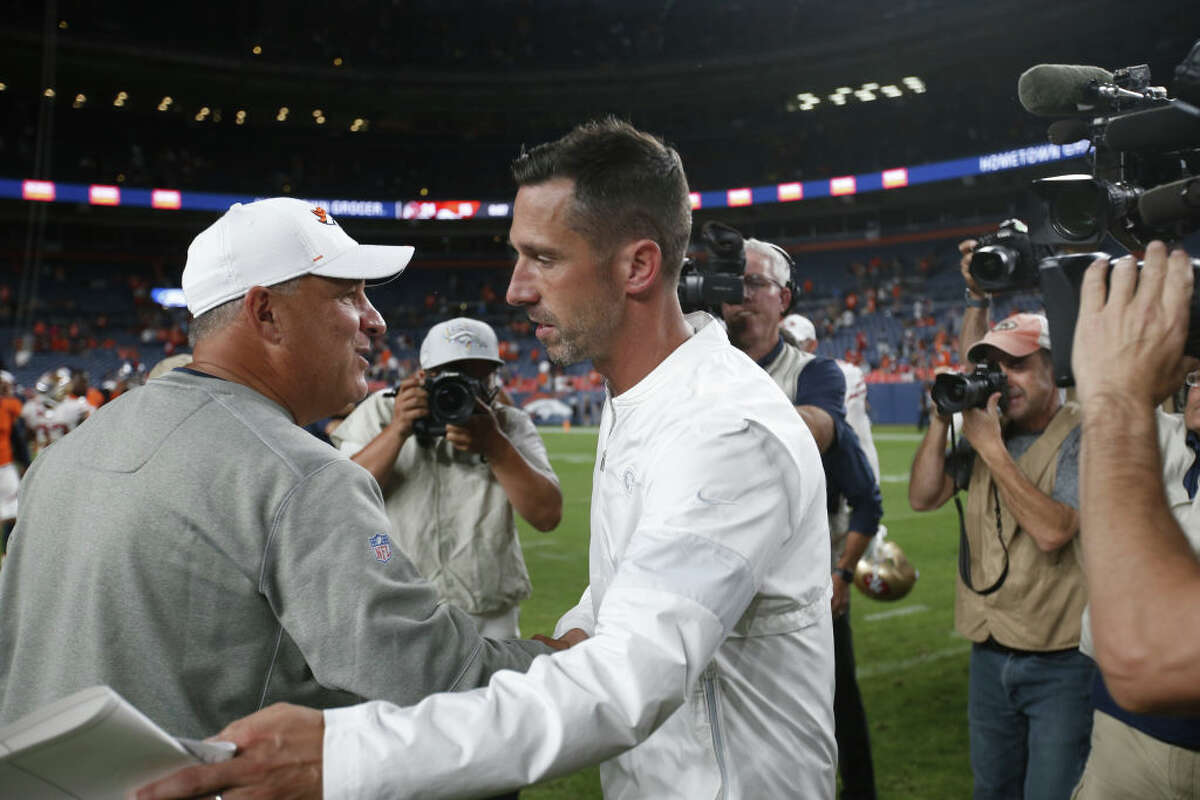 Vic Fangio, left, and Kyle Shanahan could end up sharing a coaches room together if the 49ers make enough of an effort.