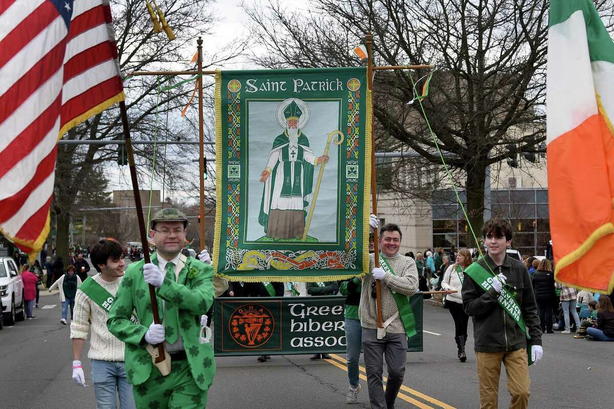 Members of the Greenwich Hibernian Association march in Greenwich's annual St. Patrick's Day Parade in 2022.  