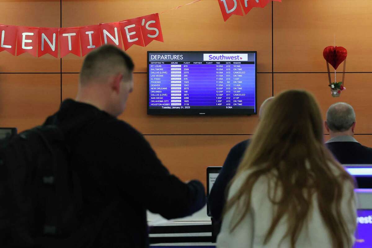 Passengers at the San Antonio International Airport, Tuesday, Jan. 31, 2023. A strong cold front has brought temperatures into the low 30’s causing icy road conditions. Southwest Airlines cancelled several flights to Dallas due to the weather.