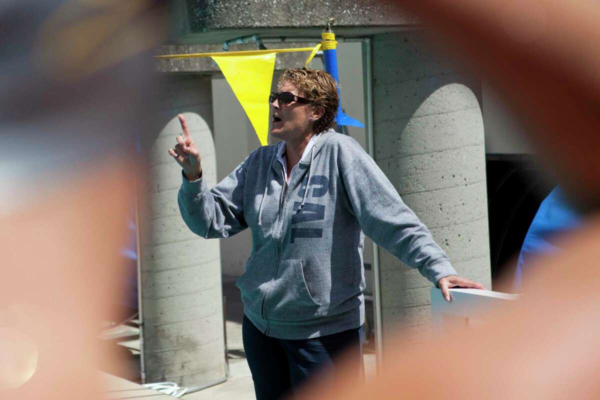 Cal’s former Head Coach of Women’s Swimming, Teri McKeever, instructs her team during daily swim practice at the Spieker Aquatics Complex on the UC Berkeley Campus in 2012. On Jan. 31, 2023, UC Berkeley fired McKeever, ending eight months of speculation after she was accused of bullying behavior so toxic that several swimmers considered suicide and others quit the team.