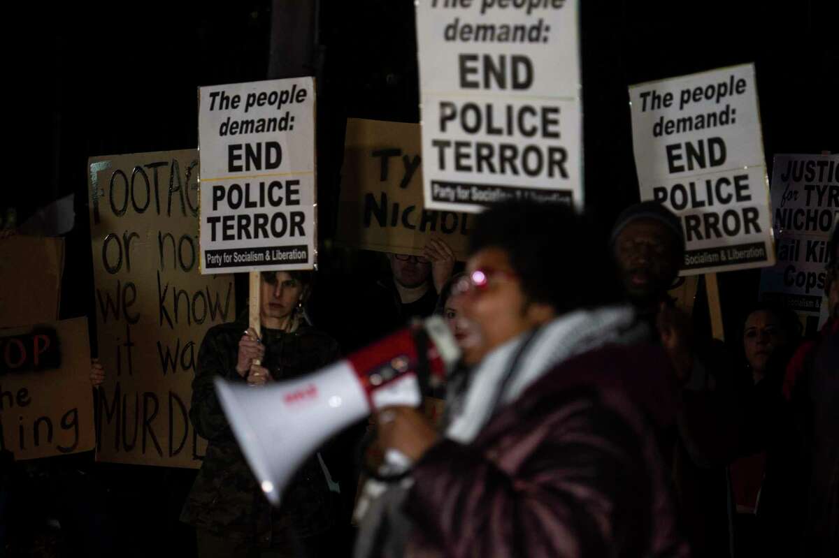 Demonstrators protest in Memphis, Tenn., on Jan. 27, 2023, following the release of a police video showing officers beating Tyre Nichols days before his death.