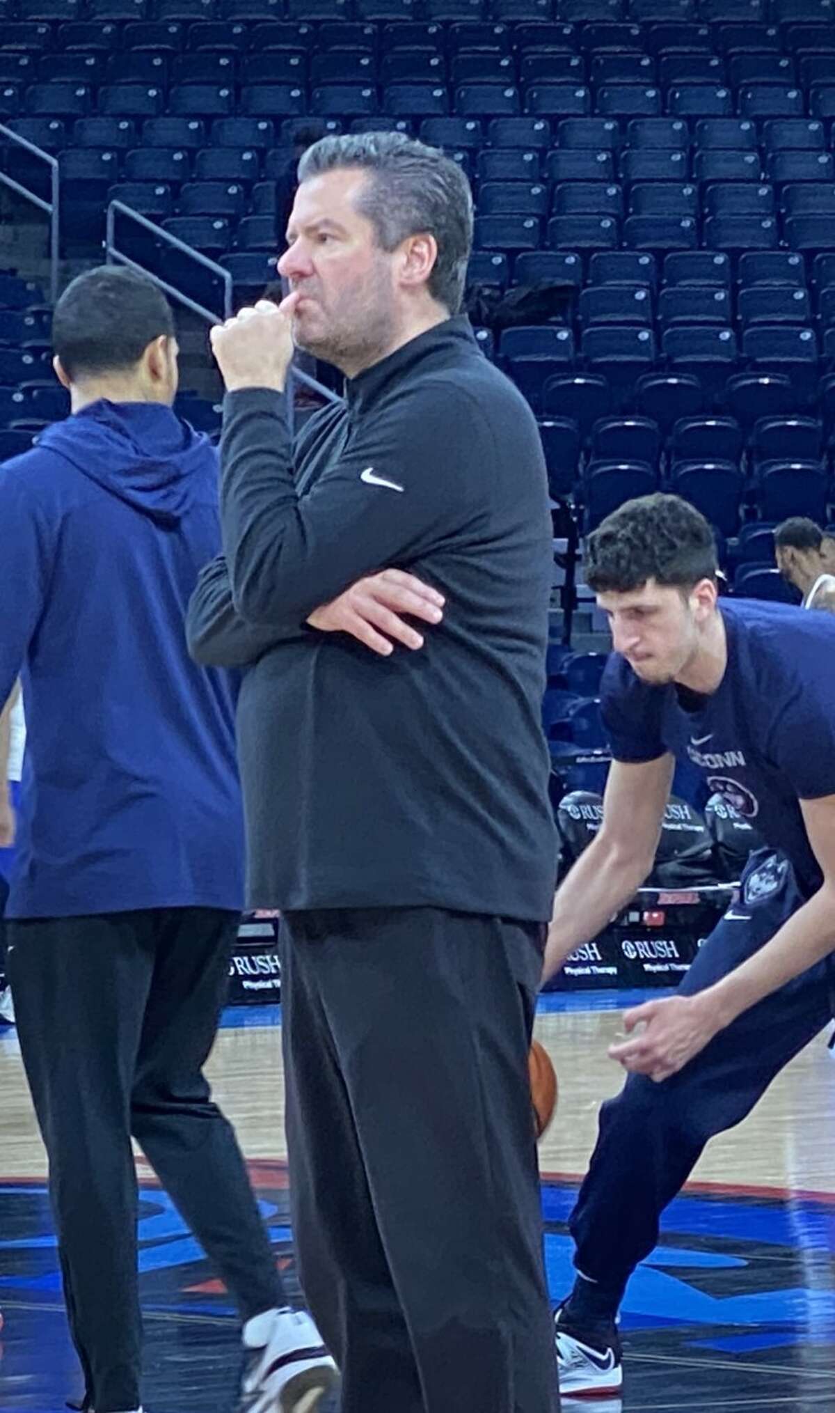 UConn assistant coach Tom Moore boasted a little growth of stubble for Tuesday night's game.