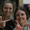 West Central fans celebrate the Cougars' win over top-ranked Routt Tuesday night in Jacksonville.