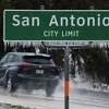 Icicles hang from a San Antonio city limit sign along the access road of IH-10 and Ralph Fair Road as motorists contend with icy conditions as a wave of frozen precipitation blankets San Antonio on Wednesday, Feb. 1, 2023.