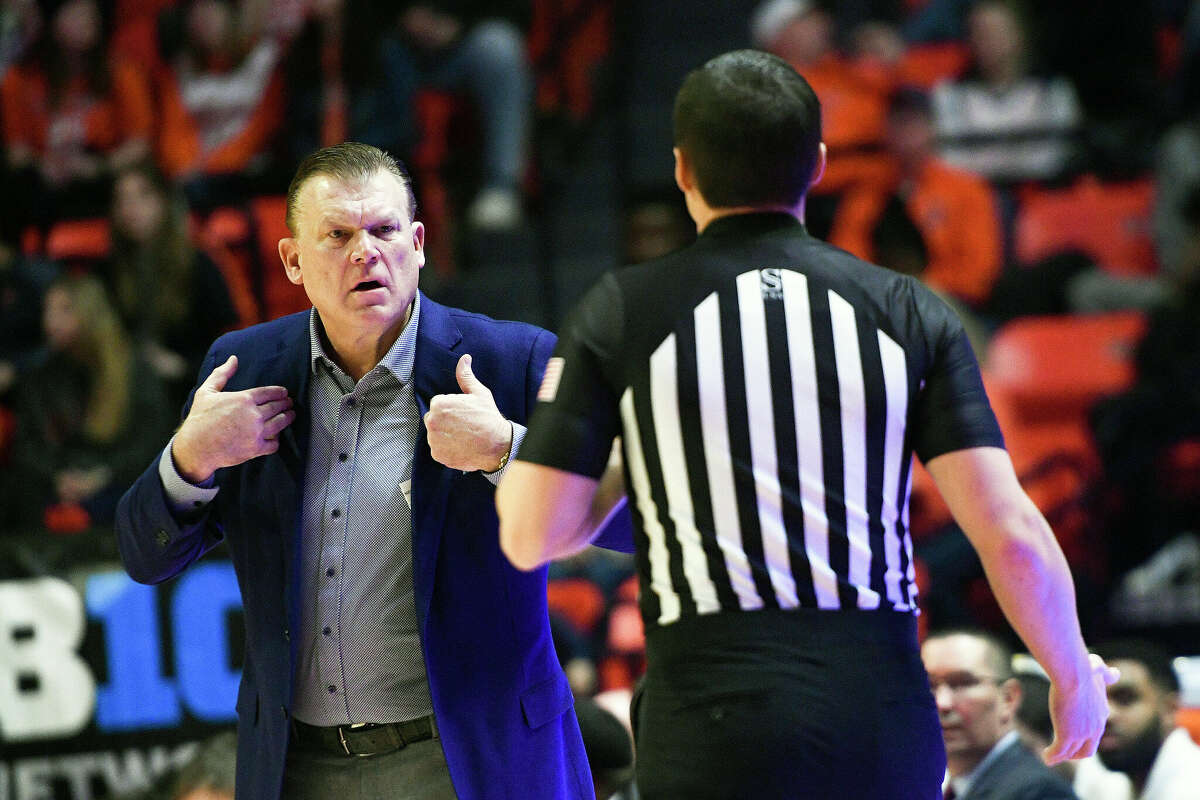 Illinois coach Brad Underwood talks to an official during the first half of Tuesday's game against Nebraska at State Farm Center. Illinois pulled  away in the second half for a 72-56 victory.  