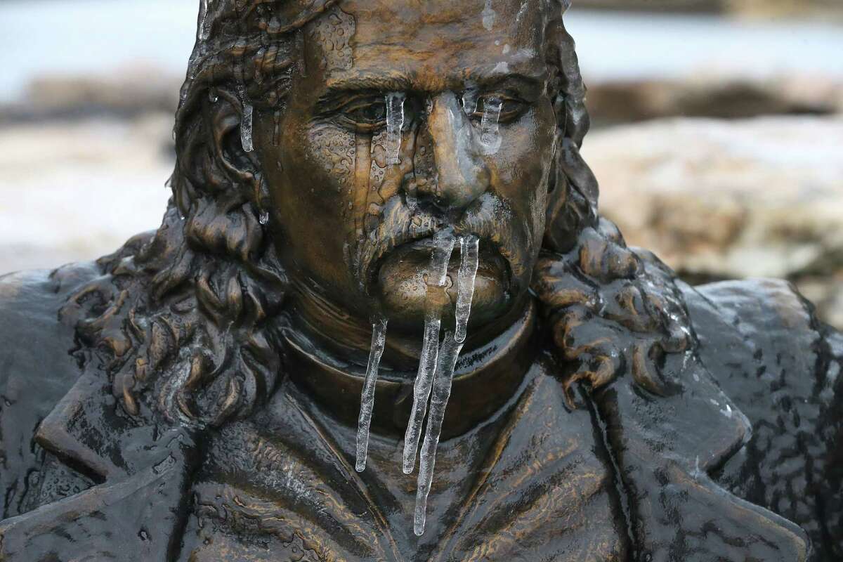 Icicles hang off the Wild Bill Hickok statue in Boerne as icy conditions from frozen precipitation blankets the town north of San Antonio on Wednesday, Feb. 1, 2023.