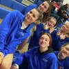The St. Paul girls basketball team celebrates after its win over Holy Cross on Tuesday, Jan. 31, 2023.
