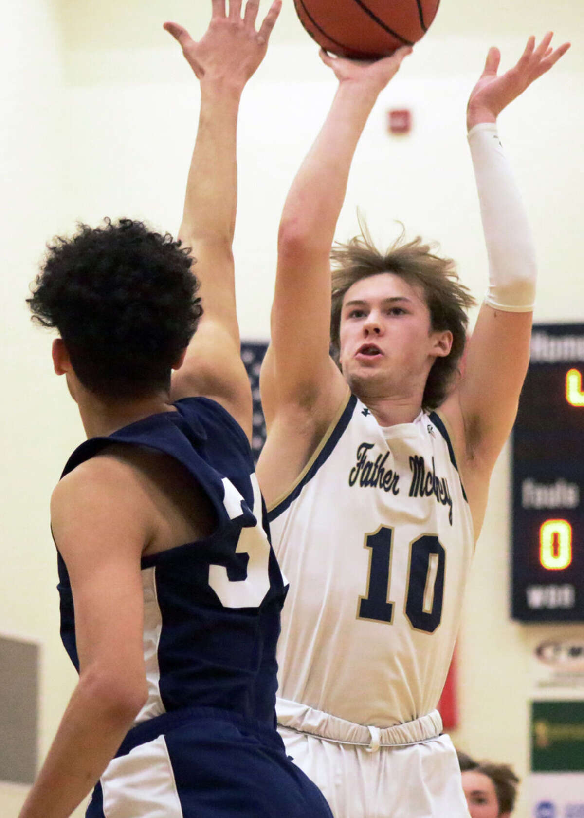 Father McGivney's Jackson Rodgers takes a jump shot against Christ Our Rock Lutheran Tuesday. Rodgers scored 12 points in the Griffins' 62-31 Gateway Metro Conference loss.