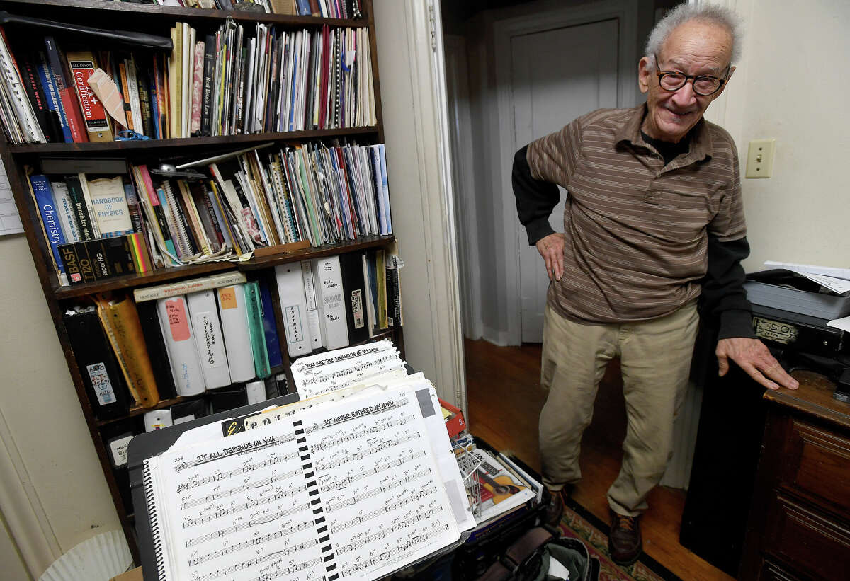 Lynn Simon, a 1961 graduate of Charlton-Pollard High School, stands in the entry of his home study, where he works on the many historical documents he's collected and chronicled about the school and neighborhood. Photo made Friday, January 27, 2023 Kim Brent/Beaumont Enterprise