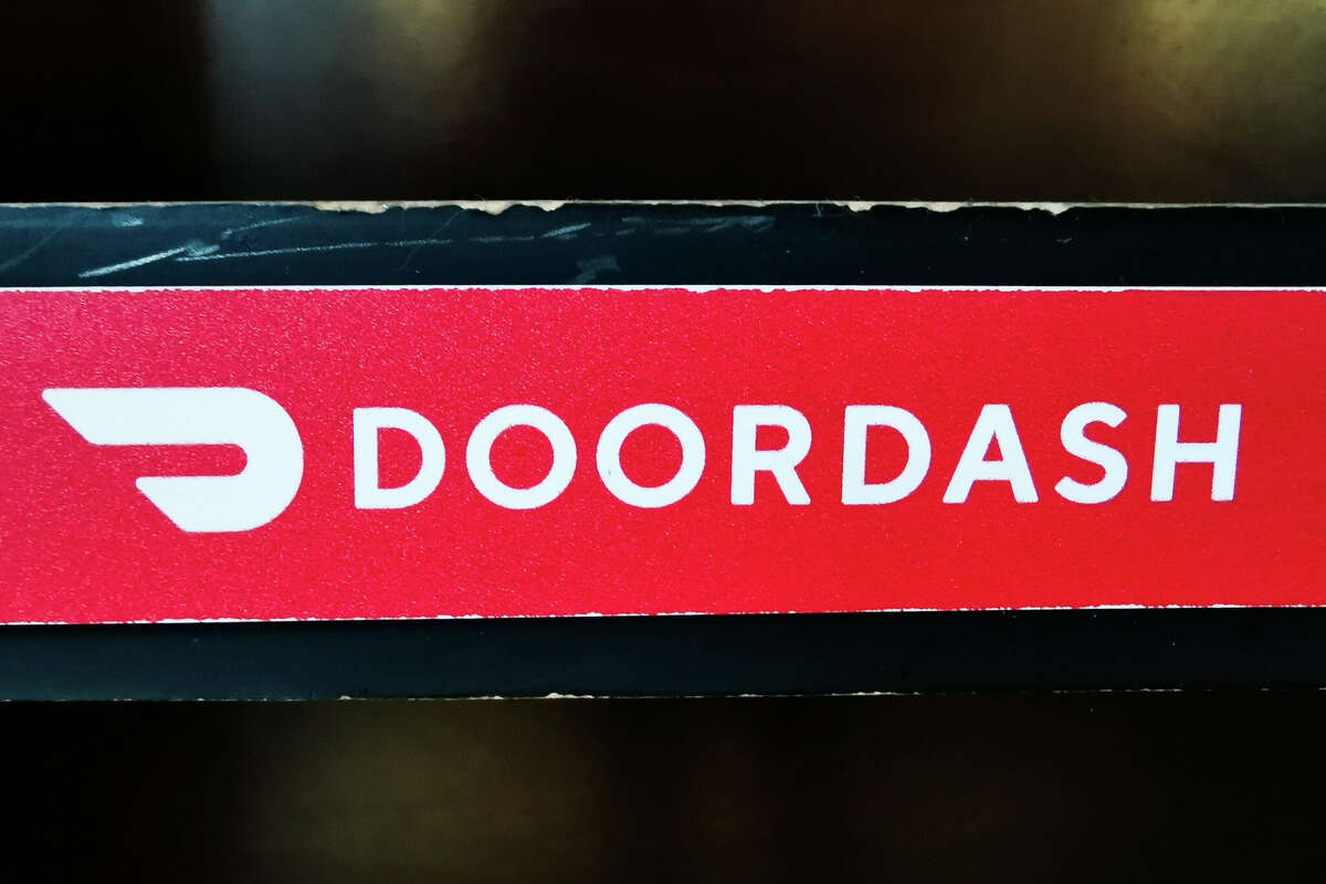 Doordash logo sign is seen in a restaurant in Chicago, United States, on October 17, 2022. (Photo by Beata Zawrzel/NurPhoto via Getty Images)
