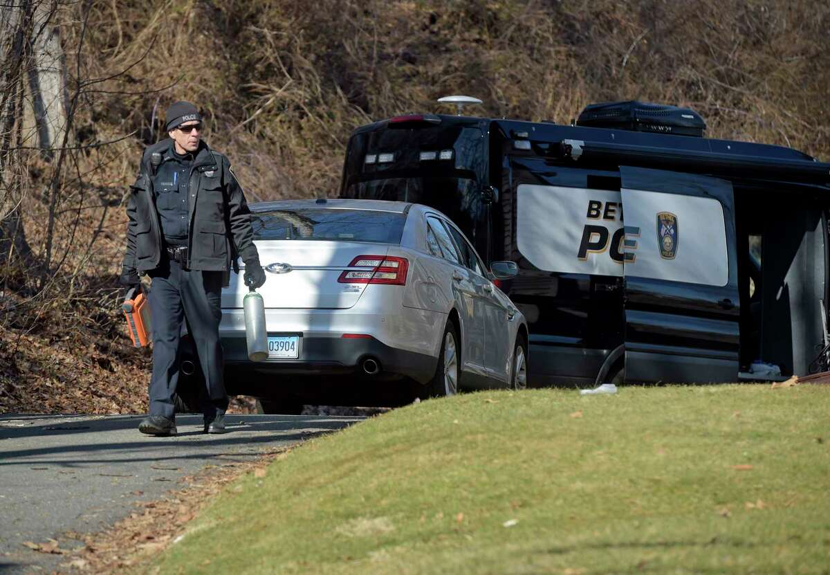 Police investigate at a house on Reservoir Street where two people have died in a suspected murder-suicide. Wednesday morning, February 1, 2023, in Bethel, Conn.