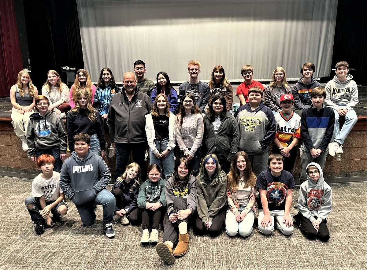 Rep. Curt VanderWall (middle row, third from left) stands for a photo with Youth in Government students from Manistee Middle High School during a Jan. 23 visit.