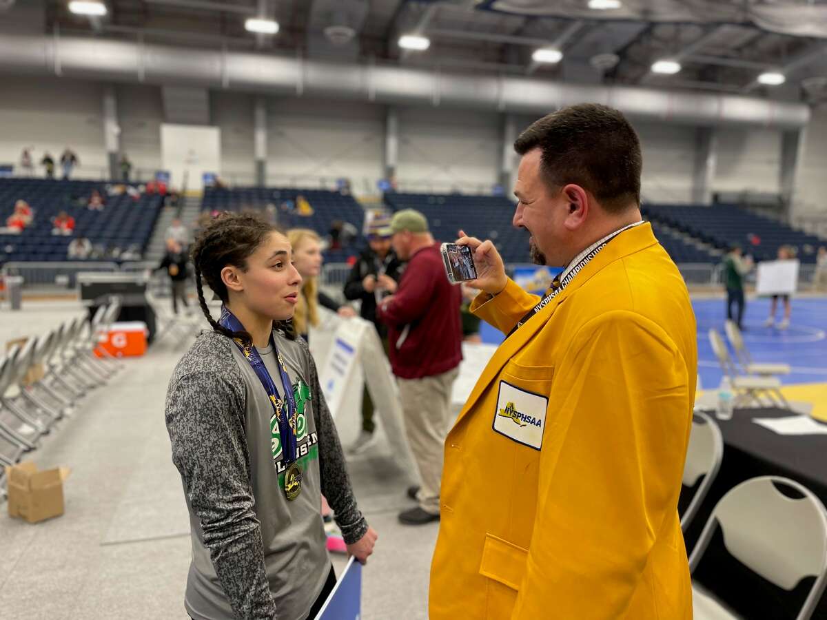 Shenendehowa's Isabella Gretzinger captured the 152-pound division at the state championships. She films a video after the event.