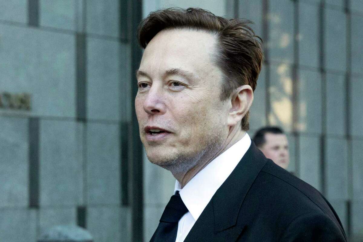 FILE - Elon Musk departs the Phillip Burton Federal Building and United States Court House in San Francisco on Jan. 24, 2023. Despite Musk's pledges, images of child sex abuse abound on Twitter.