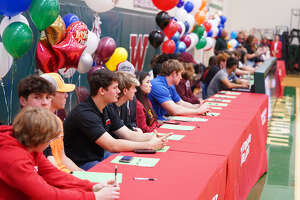 Over 40 from The Woodlands High School take part in Signing Day