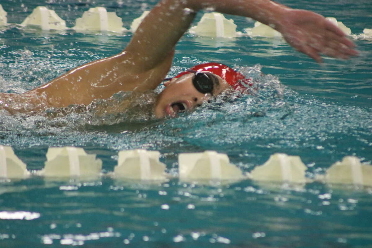 South Houston's Andres Cruz plows through the water in his pursuit for a strong time in the 500-yard freestyle Saturday night.