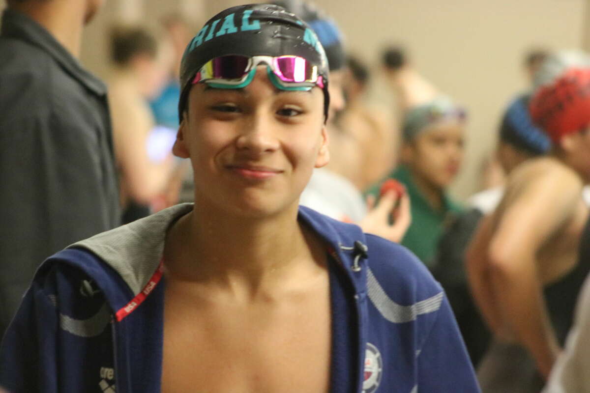 Pasadena Memorial's Levi DelAngel is headed to regionals in two events, including the 500 freestyle that he won Saturday night.